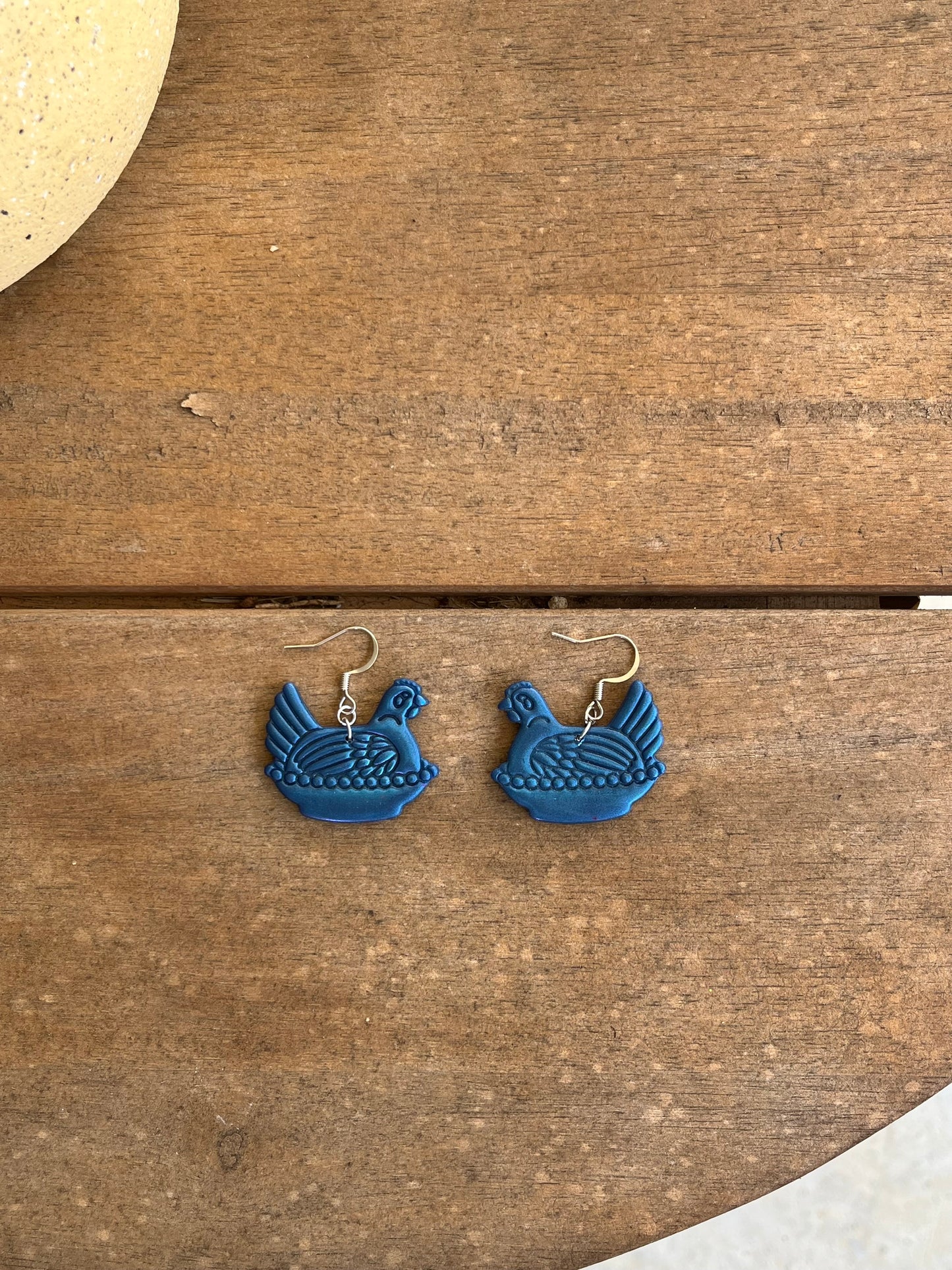 Dark Blue Hen on a Nest