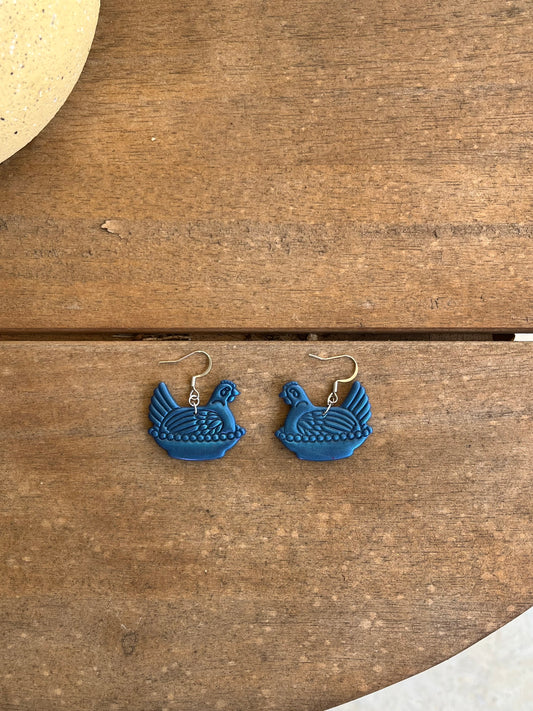 Dark Blue Hen on a Nest