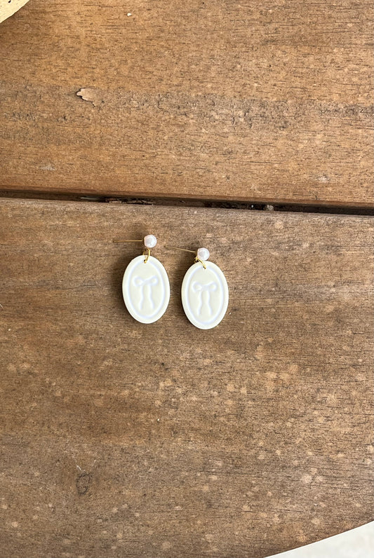 Yellow Oval Framed Bows